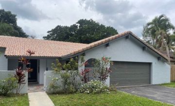 Exterior painting in Boynton Beach by Two Nations Painting & Home Improvement LLC
